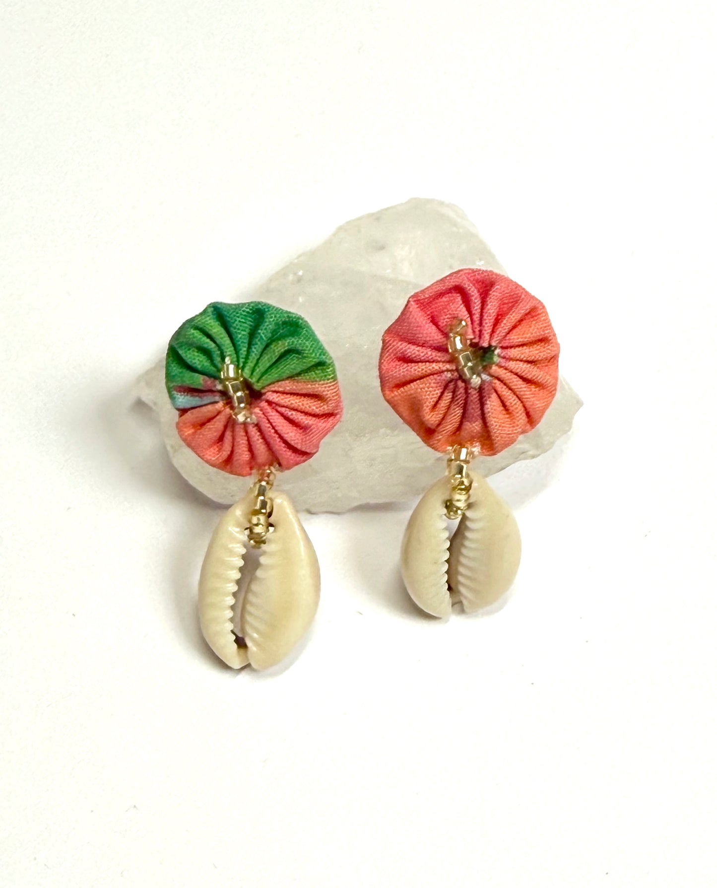 Puces coquillages roses