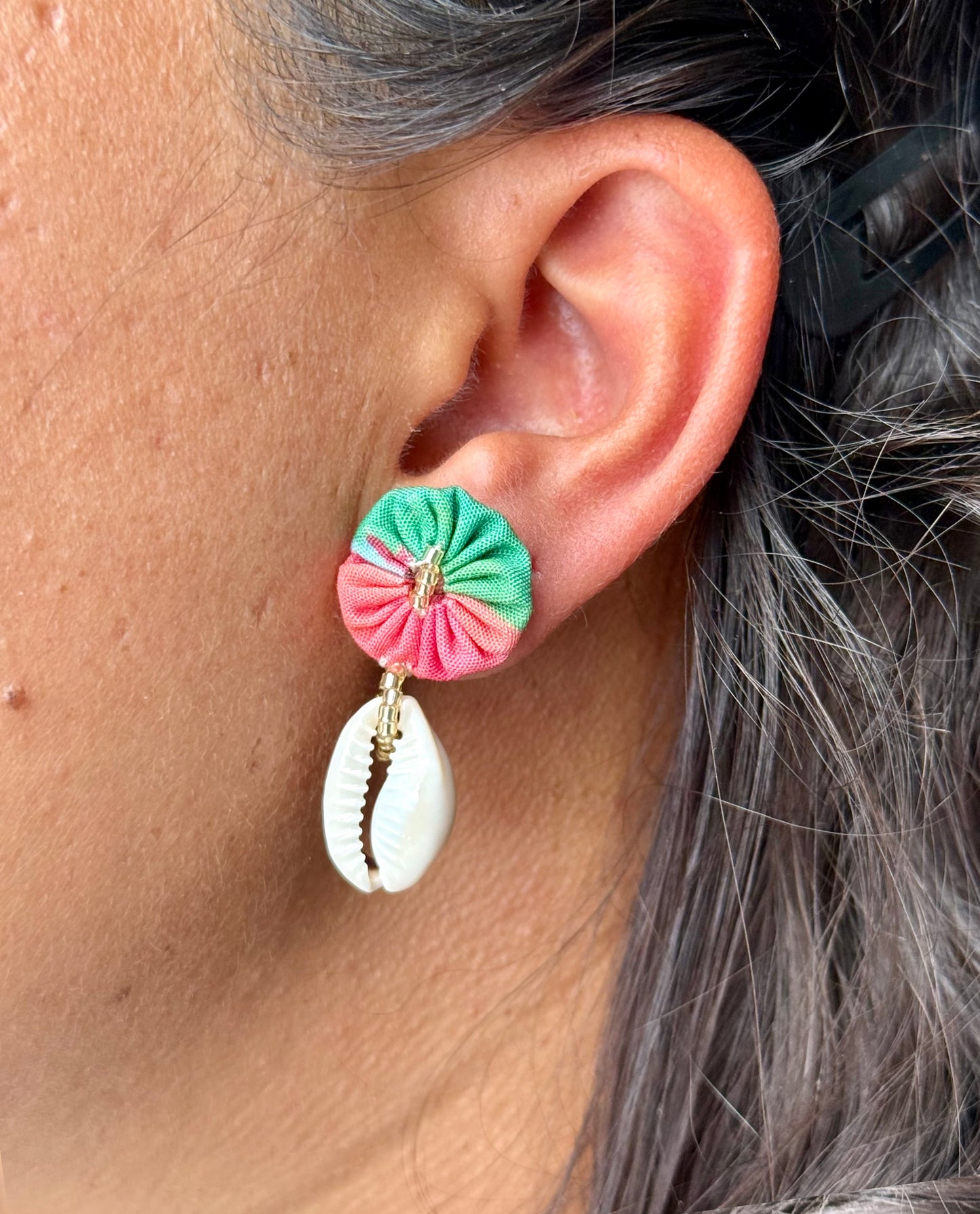 Puces coquillages roses